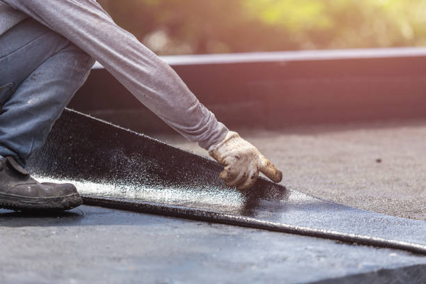 Professional Basement Waterproofing technician working in West Jefferson, OH